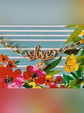 Love Gold Bracelet YG 10K With Charm Dangling From The Word Love In Script!